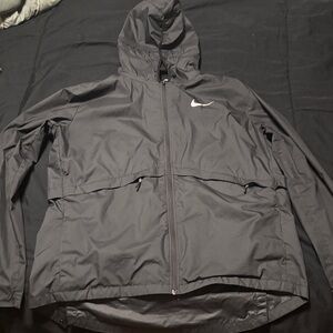 Nike Black Hooded Windbreaker Jacket with White Swoosh